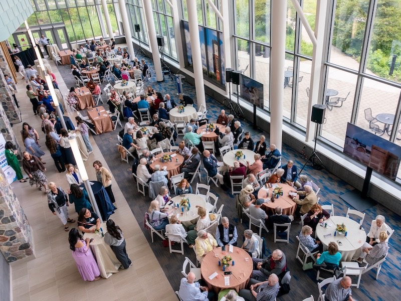 Atrium at the Mary Idema Pew Library with tables set up for an event